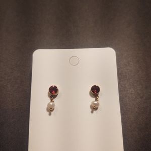 Red, white, and gold earrings